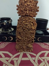 Green Man statue for