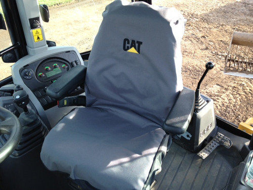 Cat backhoe seat - cat, cover