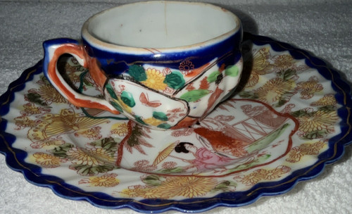 Porcelain tea cup - tea, saucer