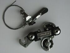 Vintage NOS Simplex rear derailleur and right hand down tube shifter