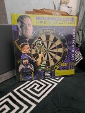 Dart Board. Luke the nuke littler championship board with 2 sets of darts. 