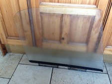 TRIUMPH HERALD/VITESSE CONVERTIBLE DOOR GLASS AND METAL RUNNER-LH-PASSENGERS