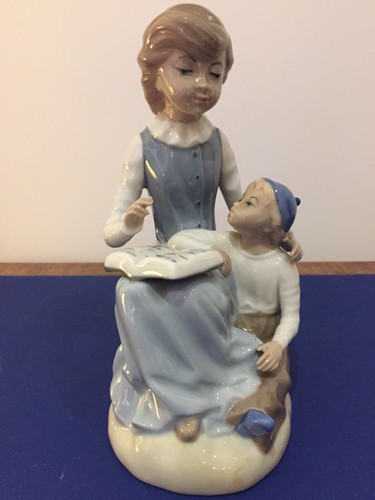 Casades figurine girl reading - figurine,