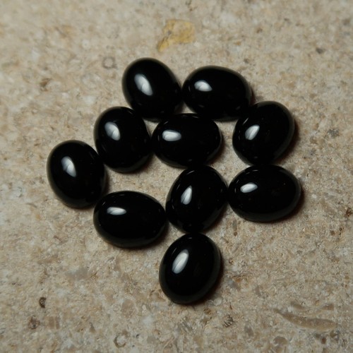 Black onyx cabochons buy - black,
