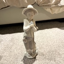 Lladro NAO Young Boy Holding