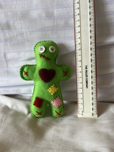Small green voodoo pagan - voodoo, doll