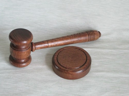 Wooden gavel block in - &, dark