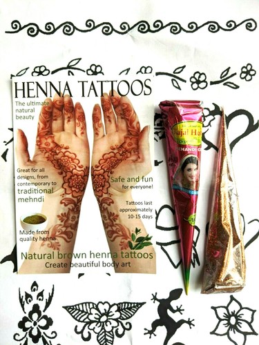 Henna and gold glitter tattoo