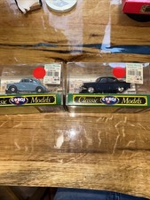 Two boxed Corgi Classic models