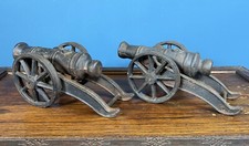 A Pair Of Vintage Heavy Cast Iron Cannons