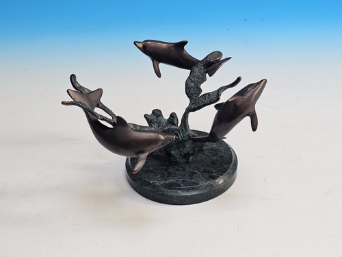 Bronze swimming dolphins - 3, ?