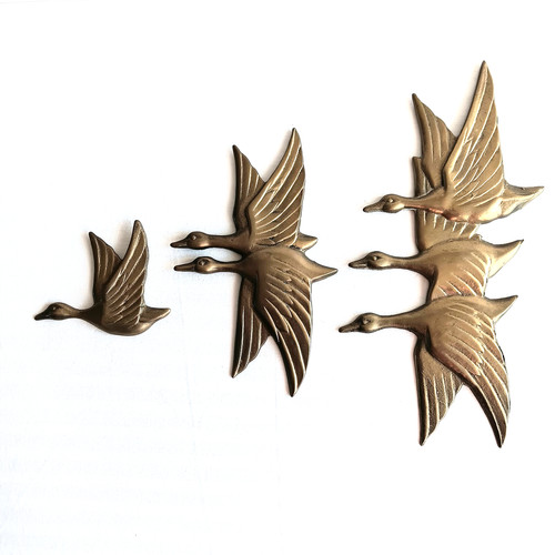 Vintage solid brass flying - solid,