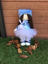  Tilda doll holding handmade