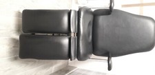 chiropody chair, black colour ,used motor need repair 