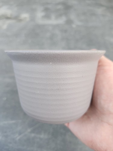 Round beige plastic plant pot - plastic,