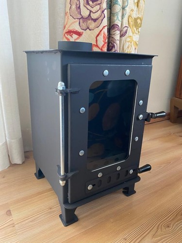 Tiny space wood stove - space,