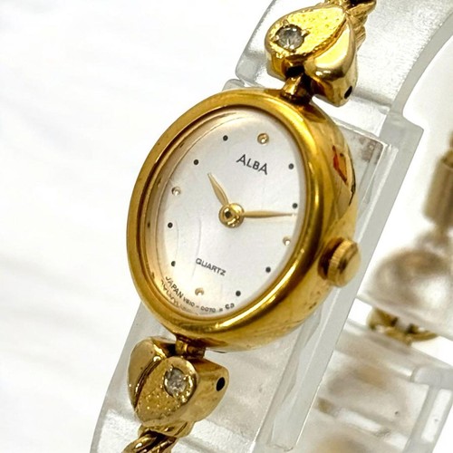 Seiko alba v810 - gold, tone