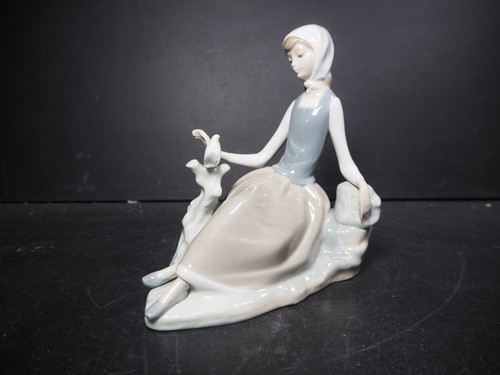 Lladro shepherdess with dove - with,