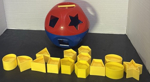 Tupperware shape toy - o,
