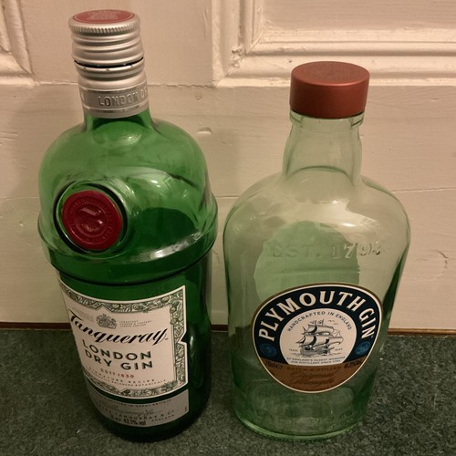 Empty gin glass bottles - glass,