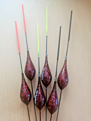 Fishing pole floats job lot