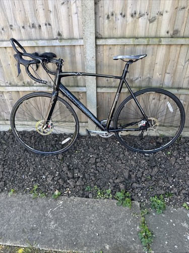 Black road bike - road, claud