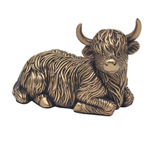 Highland Cow figurine laying