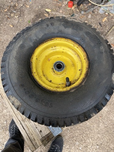 John deere ride mower wheel - on,