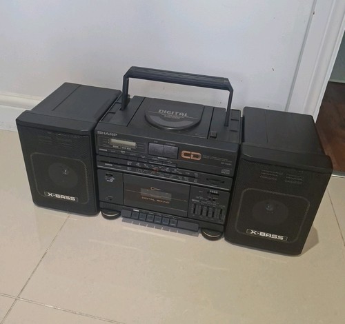 Sharp cd55e x bass - x,
