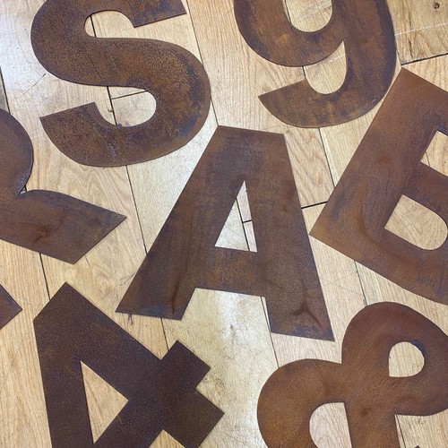 Rusty bold metal - rusty, letters