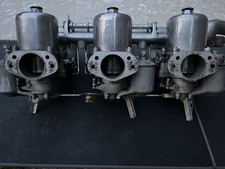 A Set Of Three Su Carburettors