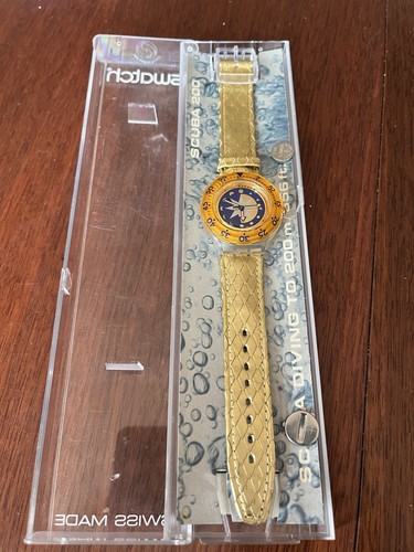 Swatch watch golden - golden, island