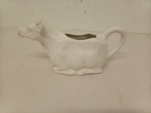 Vintage cow shaped milk jug - shaped,