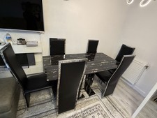 6-Seater Black Marble Dining Table with Leather Chairs