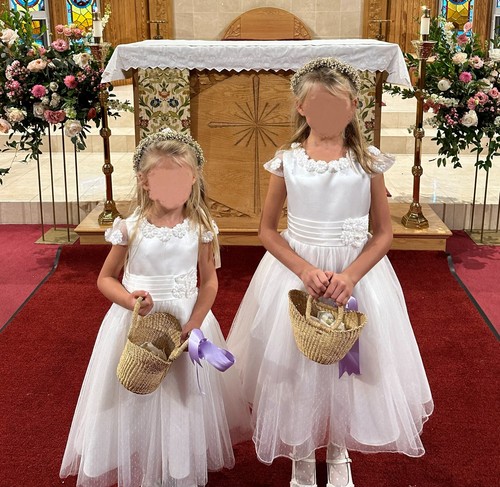 Two flower girl dresses and - flower,