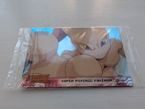 Mewtwo strikes back topps the - back,