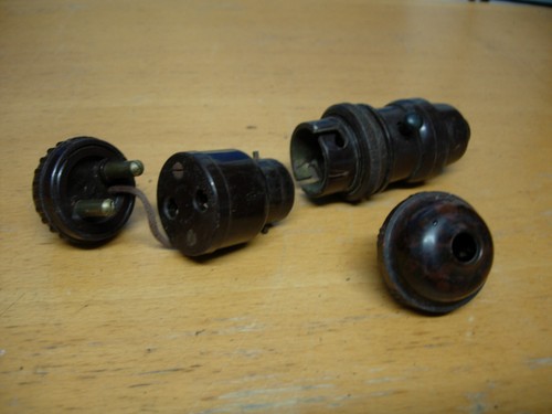 Brown bakelite pin round - bakelite,