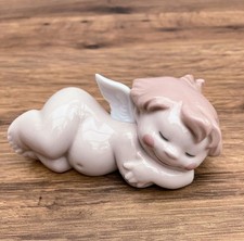 Adorable Nao by Lladro Cheeky