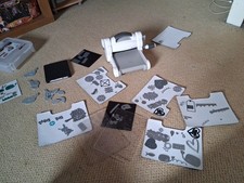 sizzix big shot machine with dies and boards