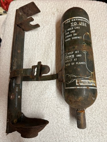 Antique fire extinguisher with - fire,
