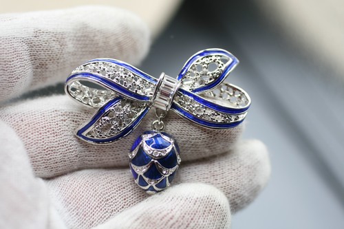 Silver tone bow blue - tone,