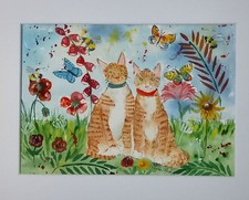 Ginger kittens among Flowers