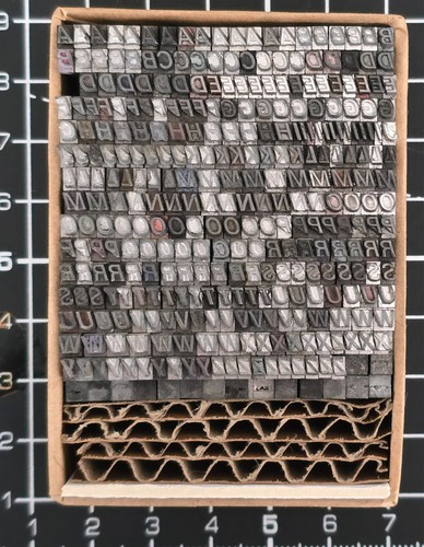 10pt univers italic caps - italic,