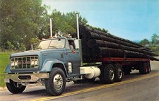 GMC Semi Truck Advertising Flat Bed Hauling Telephone Poles 1965 postcard N66