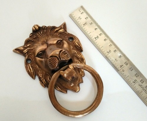 Large heavy lions head urn