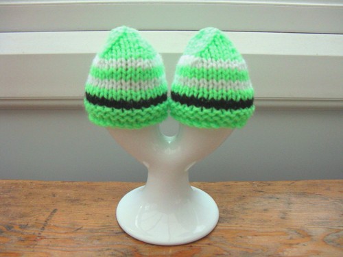 Two hand knitted - two,