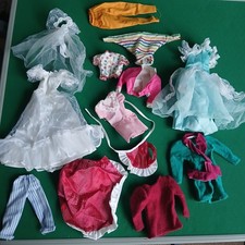 11 Genuine Barbie And 2