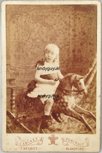 Cabinet card girl rocking - cabinet,