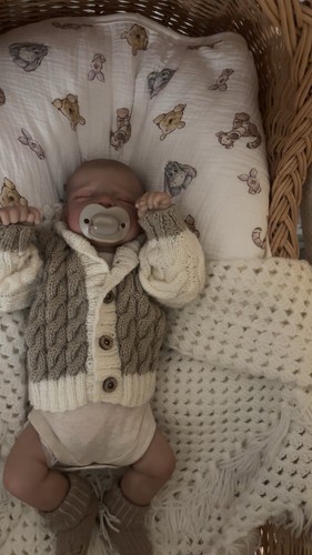Weighted reborn baby doll - ,