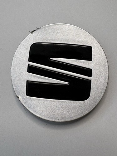 Genuine seat badge - badge, alloy